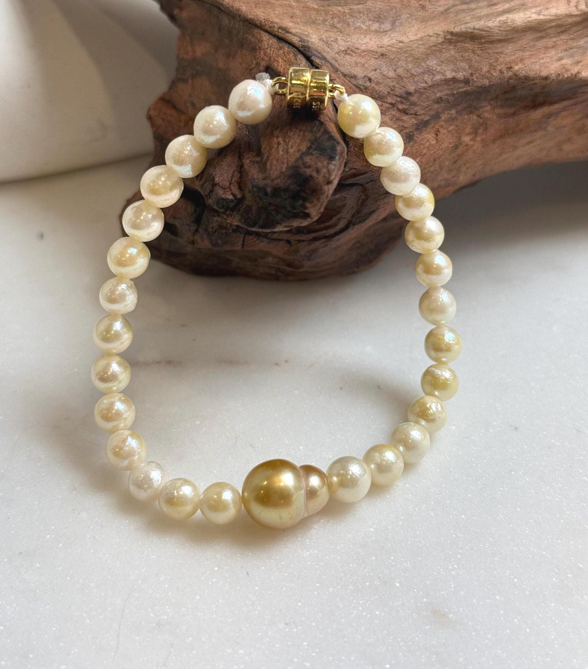 Elly’s 10.7mm South sea Gourd deep golden Akoya ocean Pearls Bracelet: Extreme luster mirrored, S925 silver Bracelet. Different size.
