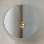 Elly’s 10.4mm Genius South sea deep gold ocean pearl Pendant: Extreme luster, 1.4cm high, s925 silver 18k gold plated pendant.