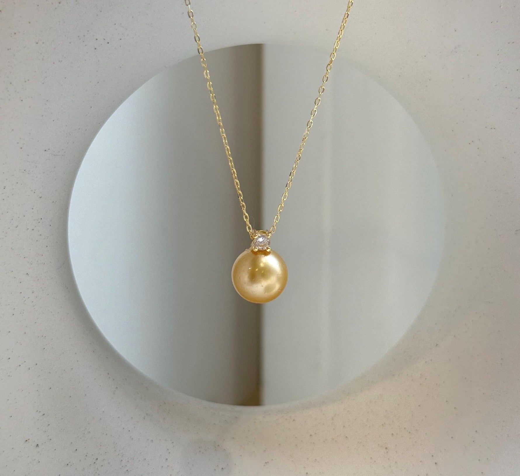 Elly’s 10.4mm Genius South sea deep gold ocean pearl Pendant: Extreme luster, 1.4cm high, s925 silver 18k gold plated pendant.