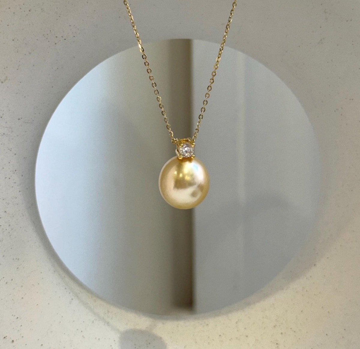 Elly’s 12.6mm Genius South sea champagne gold ocean pearl Pendant: Extreme luster mirrored, 1.8cm high, s925 silver pendant.