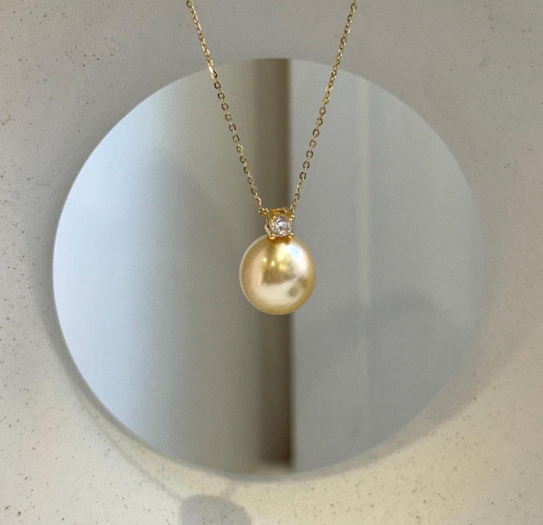 Elly’s 12.6mm Genius South sea champagne gold ocean pearl Pendant: Extreme luster mirrored, 1.8cm high, s925 silver pendant.