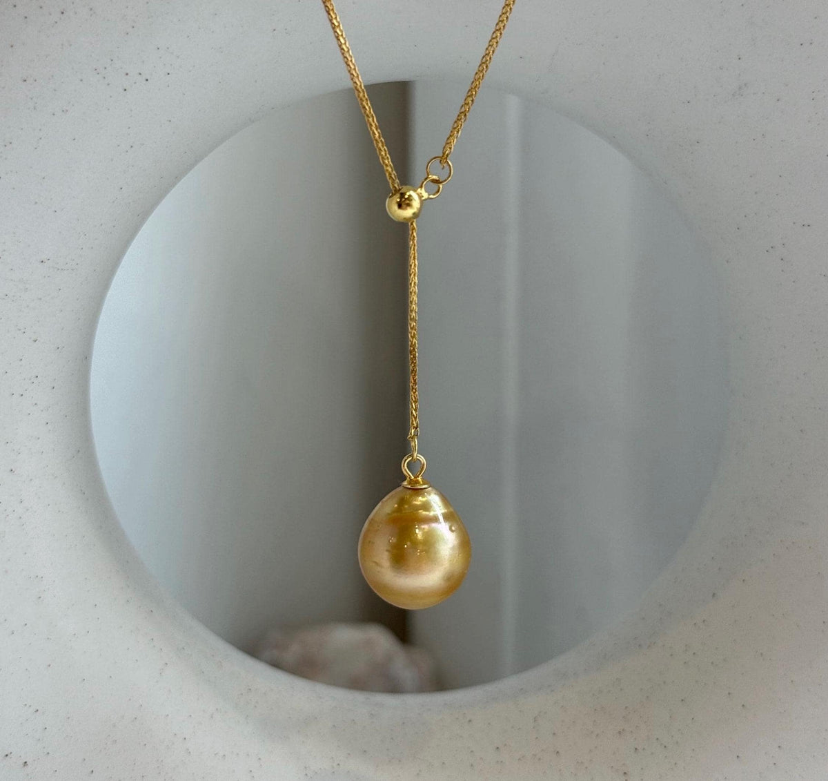 Elly’s 12.2mm Genius South sea deep tea golden ocean pearl Pendant: Extreme luster mirrored, to 17.3”, s925 silver Y-Lariat chain set.