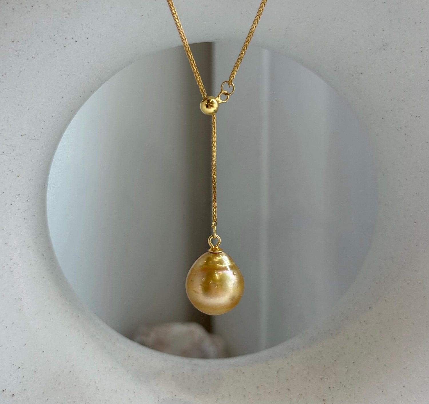 Elly’s 12.2mm Genius South sea deep tea golden ocean pearl Pendant: Extreme luster mirrored, to 17.3”, s925 silver Y-Lariat chain set.