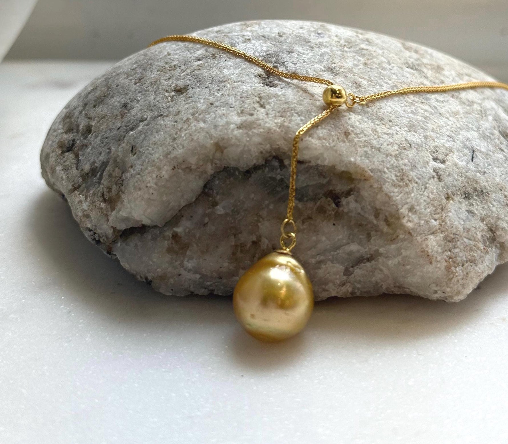 Elly’s 12.2mm Genius South sea deep tea golden ocean pearl Pendant: Extreme luster mirrored, to 17.3”, s925 silver Y-Lariat chain set.