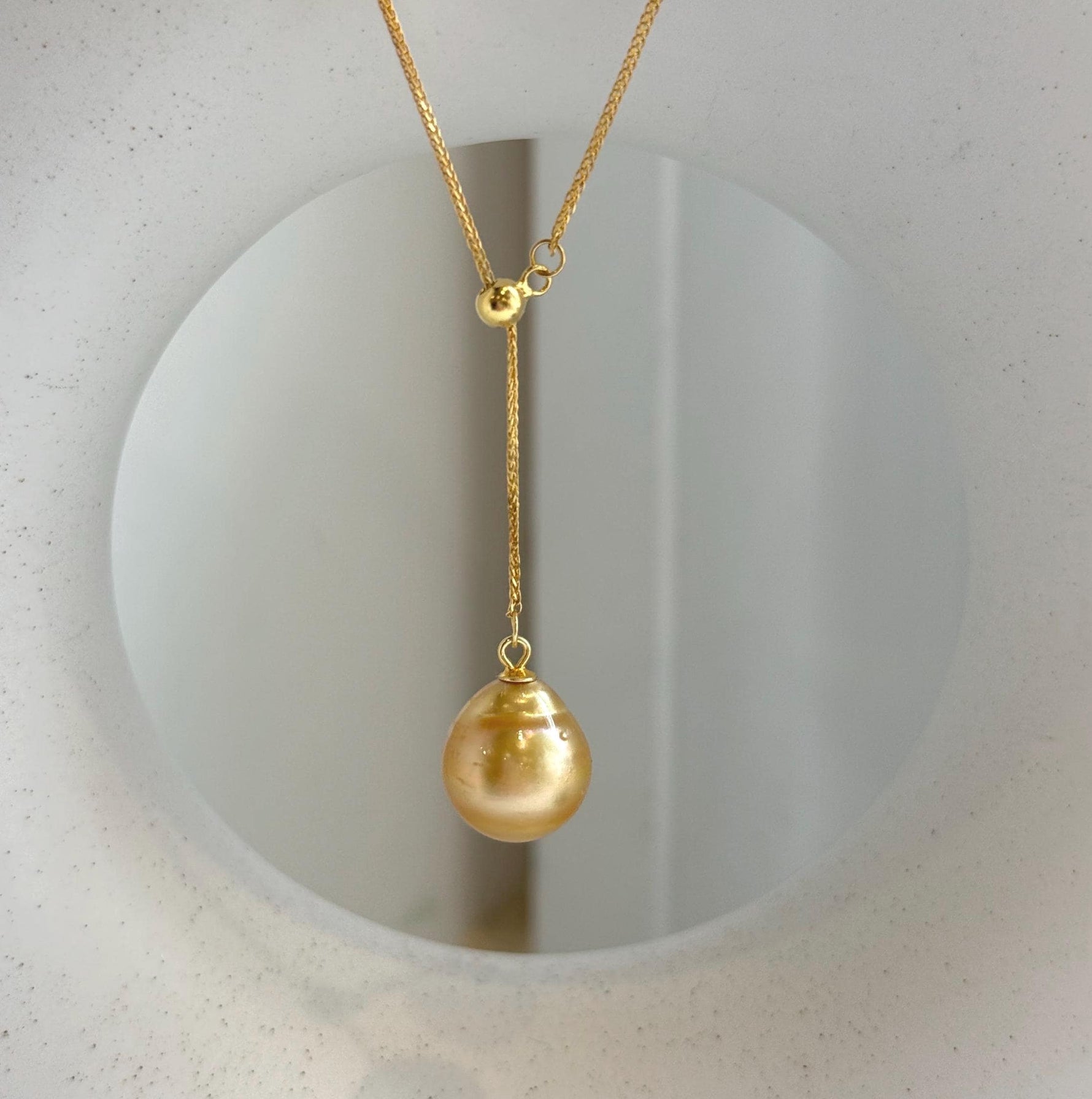Elly’s 12.2mm Genius South sea deep tea golden ocean pearl Pendant: Extreme luster mirrored, to 17.3”, s925 silver Y-Lariat chain set.