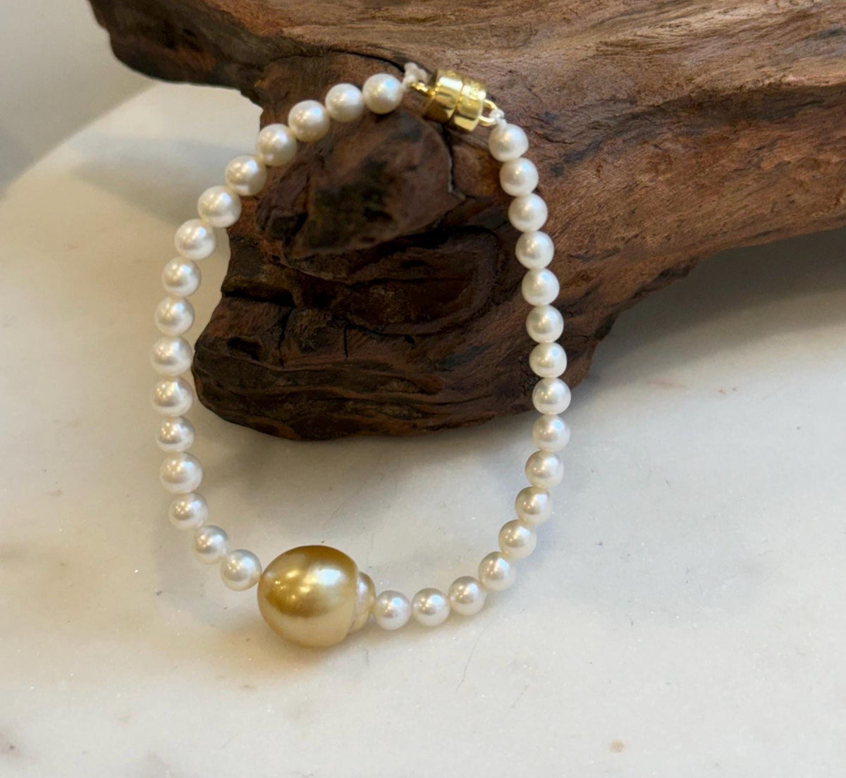 Elly’s 11.7mm South sea deep golden Freshwater Pearls Bracelet: Extreme luster mirrored, S925 silver Bracelet. Different size.