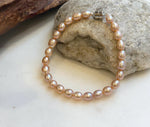 Elly’s Bracelet Peach rose Pearls: Extreme luster mirrored, 5.5-6mm, S925 silver magnetic clips Bracelet, different sizes.