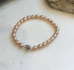 Elly’s Bracelet Peach rose Pearls: Extreme luster mirrored, 5.5-6mm, S925 silver magnetic clips Bracelet, different sizes.