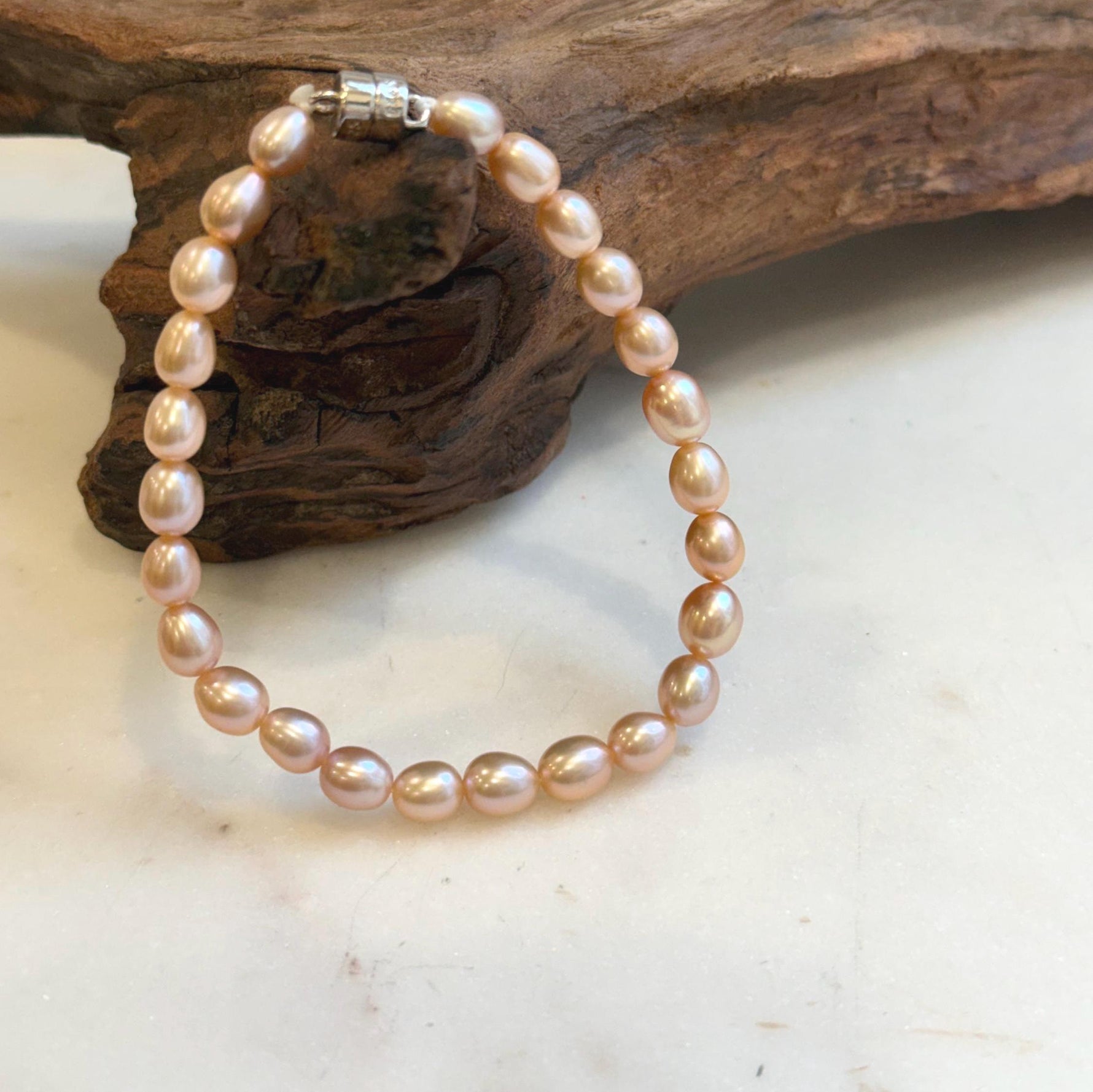 Elly’s Bracelet Peach rose Pearls: Extreme luster mirrored, 5.5-6mm, S925 silver magnetic clips Bracelet, different sizes.