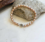 Elly’s Bracelet Peach rose Pearls: Extreme luster mirrored, 5.5-6mm, S925 silver magnetic clips Bracelet, different sizes.