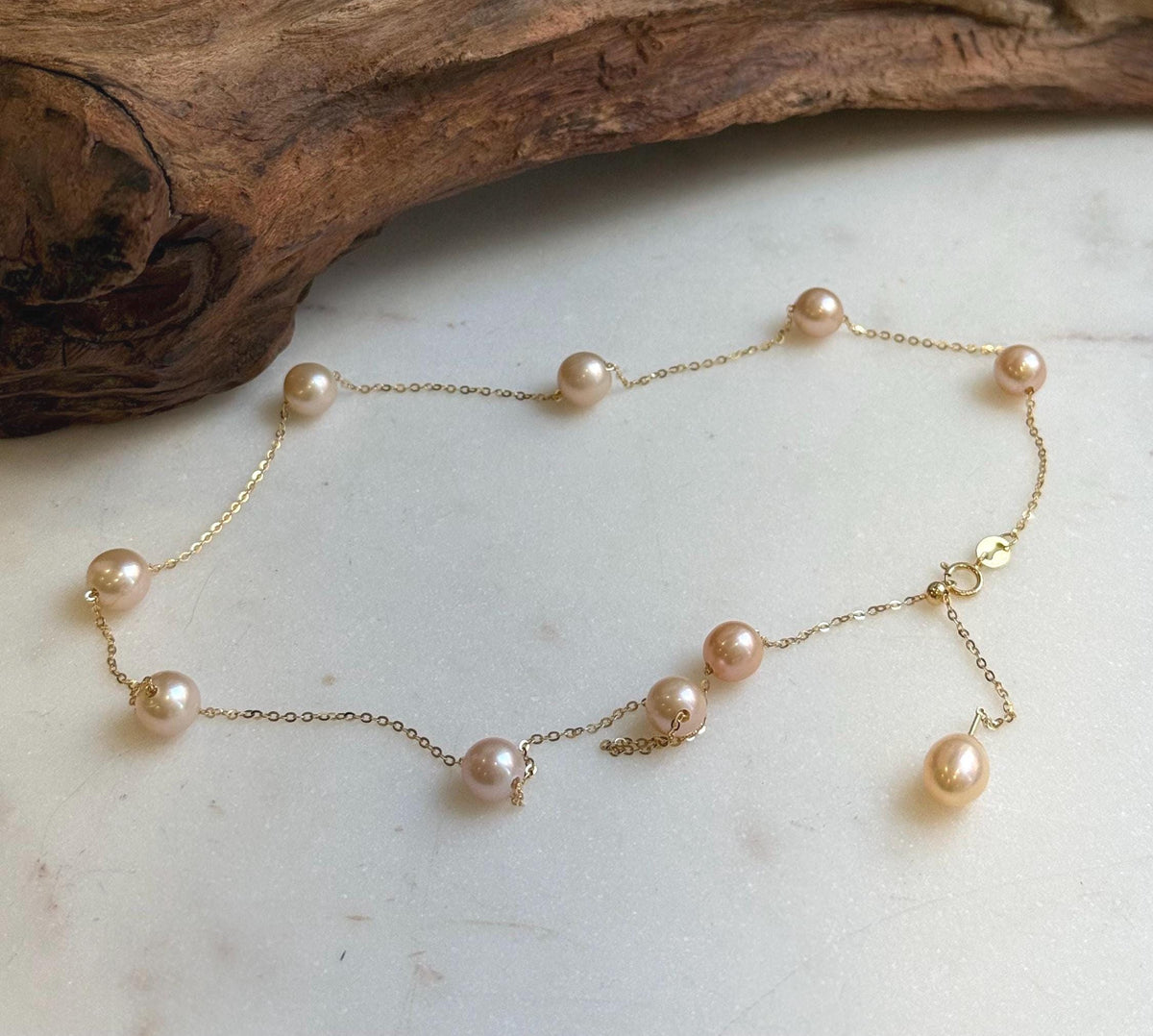 Elly’s 10pcs 7-7.8mm Freshwater peach pearls Satellite Necklace: Extreme luster mirrored, S925 silver satellite necklace, to 18.1”.