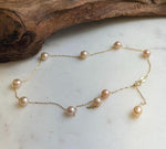 Elly’s 10pcs 7-7.8mm Freshwater peach pearls Satellite Necklace: Extreme luster mirrored, S925 silver satellite necklace, to 18.1”.