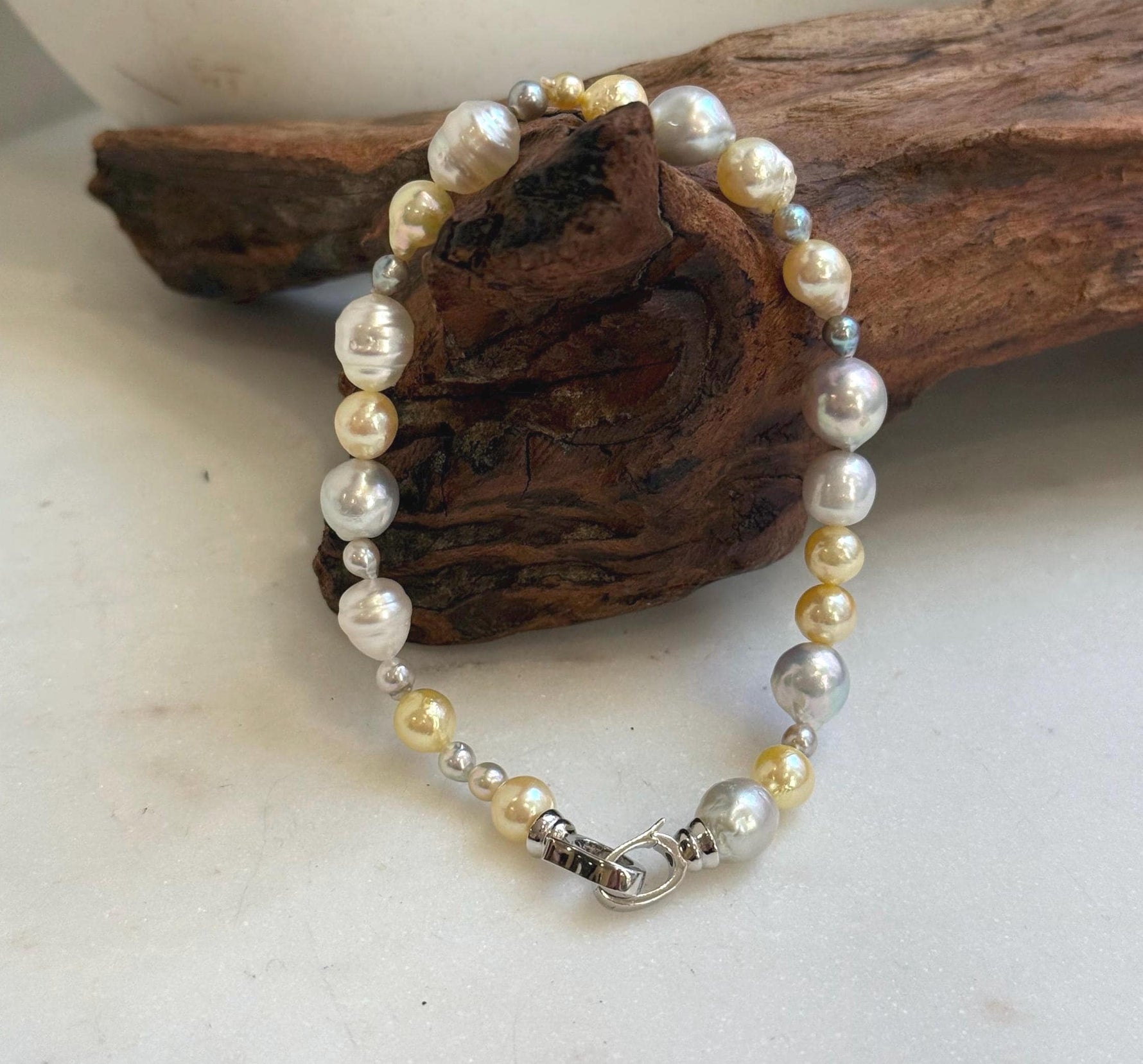 Elly’s Multicolor Ocean Pearls Bracelet: Extreme luster, Australian White Akoya ocean Pearls, 3.5-8.6, 8.3”, S925 silver bracelet.
