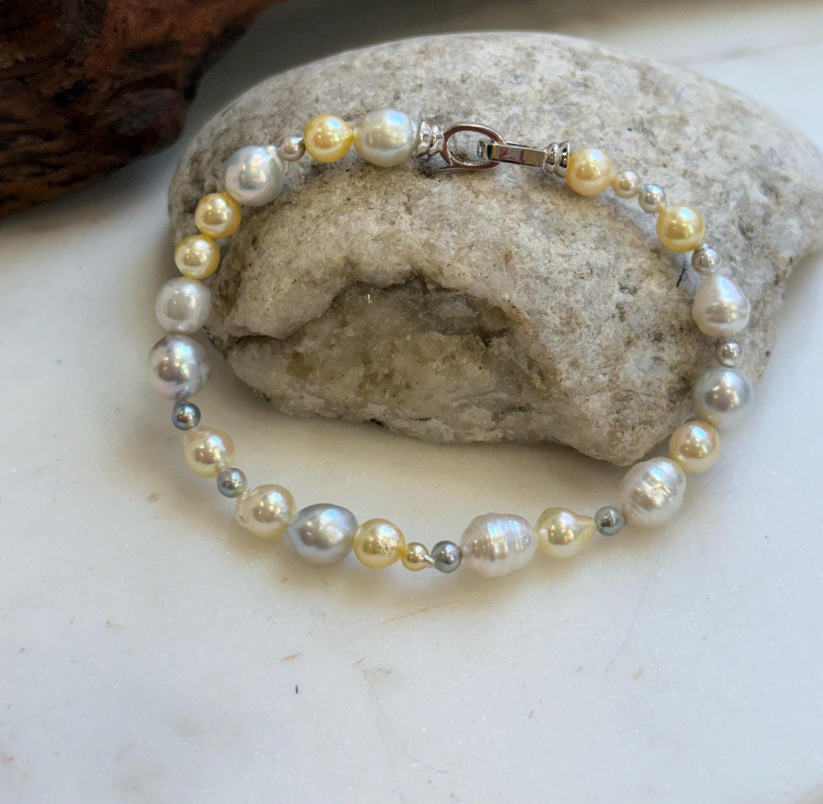 Elly’s Multicolor Ocean Pearls Bracelet: Extreme luster, Australian White Akoya ocean Pearls, 3.5-8.6, 8.3”, S925 silver bracelet.