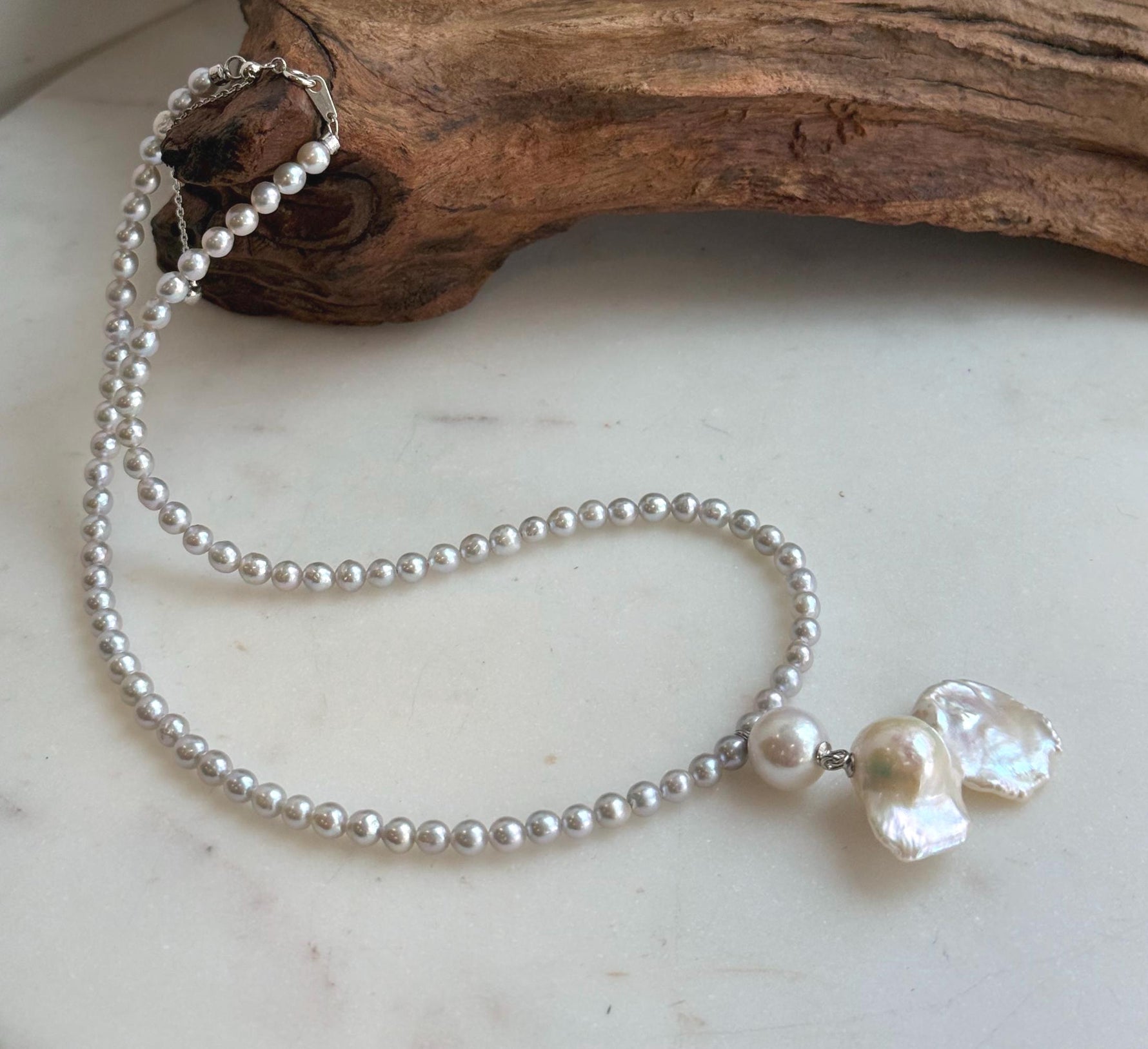 Elly’s Freshwater Large Petal baroque white pearl necklace:Extreme luster mirrored, 19.3x31mm, to 17.9”, S925 silver necklace strand.