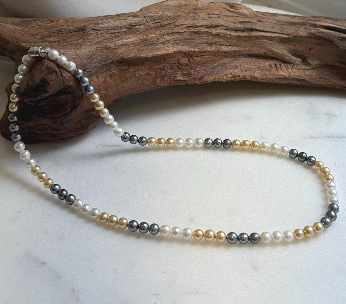 Elly’s 5.2-5.6mm  Freshwater White golden peacock pearls necklace: Extreme luster mirrored, 17.5”, s925 silver necklace strand.