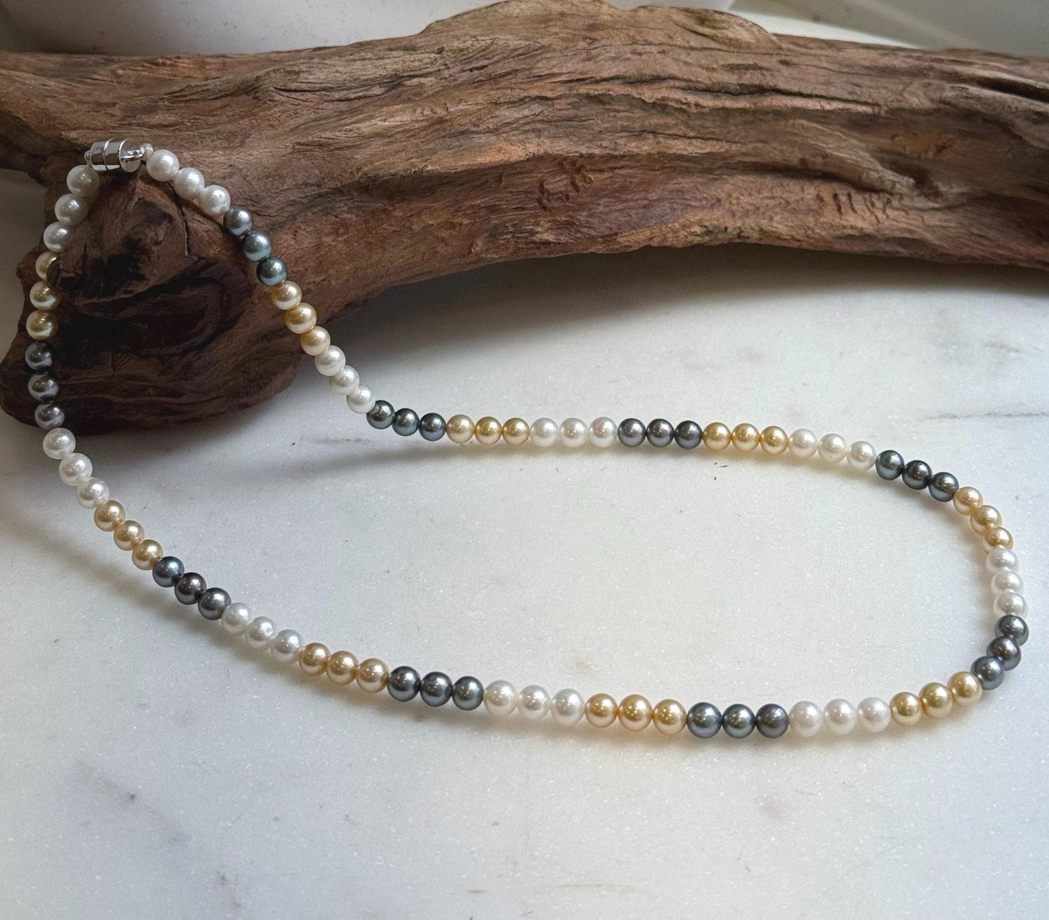 Elly’s 5.2-5.6mm  Freshwater White golden peacock pearls necklace: Extreme luster mirrored, 17.5”, s925 silver necklace strand.