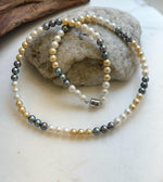 Elly’s 5.2-5.6mm  Freshwater White golden peacock pearls necklace: Extreme luster mirrored, 17.5”, s925 silver necklace strand.