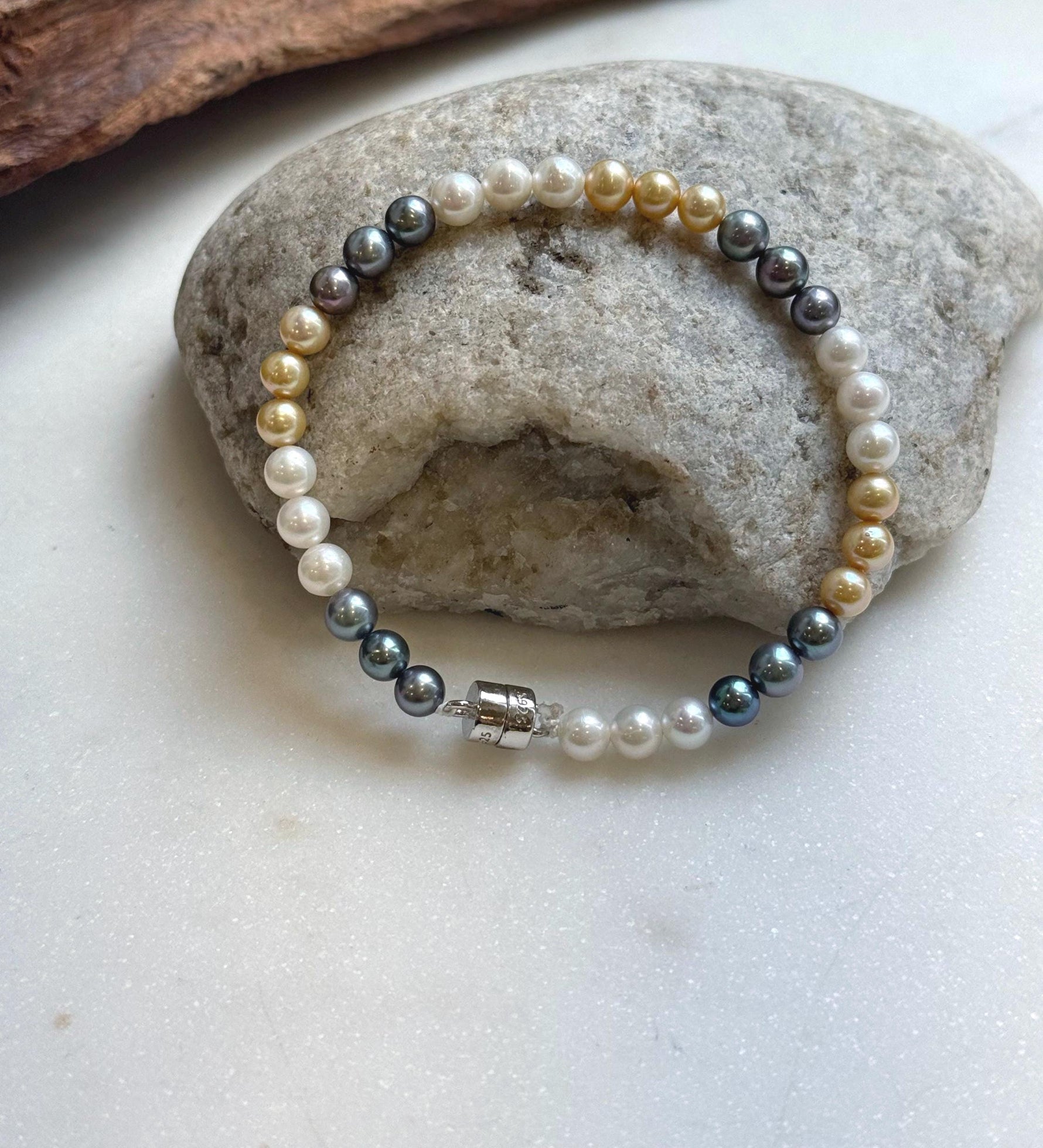 Elly’s 5.2-5.5mm  Freshwater White golden peacock pearls bracelet: Extreme luster mirrored, s925 silver bracelet, different sizes.