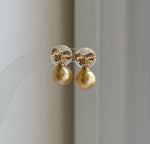 Elly’s 9.1mm South sea deep golden ocean Pearls Earrings: Extreme luster mirrored, 1.6cm high, S925 silver cool earrings.