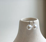Elly’s 10mm White Edison Pearls High Heel Earrings hooks: Extreme luster Mirrored, S925 silver minimalist earrings studs.