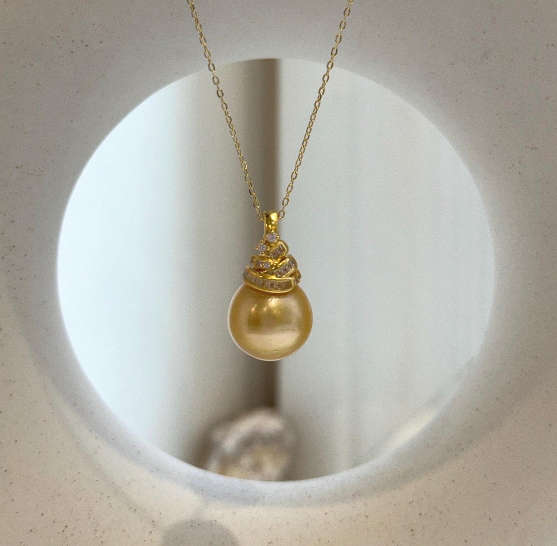 Elly’s 13.5mm South Sea deep Golden ocean Pearl pendant: Extreme luster, 2.4cm high, S925 silver 18k gold plated pendant.