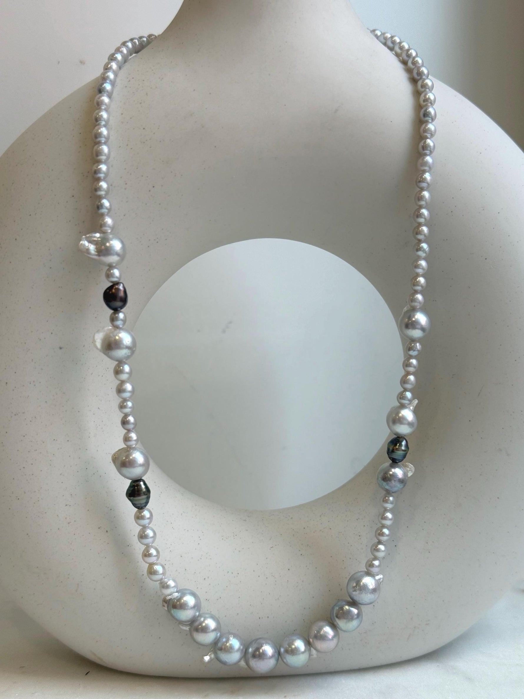 Elly’s Akoya tail baroque ocean white Freshwater pearls necklace:Extreme luster mirrored, 18.2”, S925 silver necklace strand.