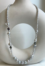 Elly’s Akoya tail baroque ocean white Freshwater pearls necklace:Extreme luster mirrored, 18.2”, S925 silver necklace strand.