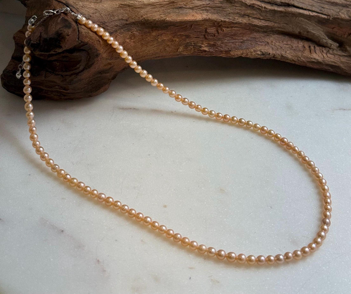 Elly’s 3.6-4mm Freshwater Peach gold Pearls Necklace: Extreme luster mirrored, To 18.3”, S925 silver necklace strand.