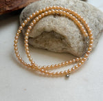 Elly’s 3.6-4mm Freshwater Peach gold Pearls Necklace: Extreme luster mirrored, To 18.3”, S925 silver necklace strand.