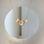 Elly’s Tri Au750 18k Gold South sea golden Akoya ocean Pearls Floating pendants:Extreme luster, 7.7-11.7mm.