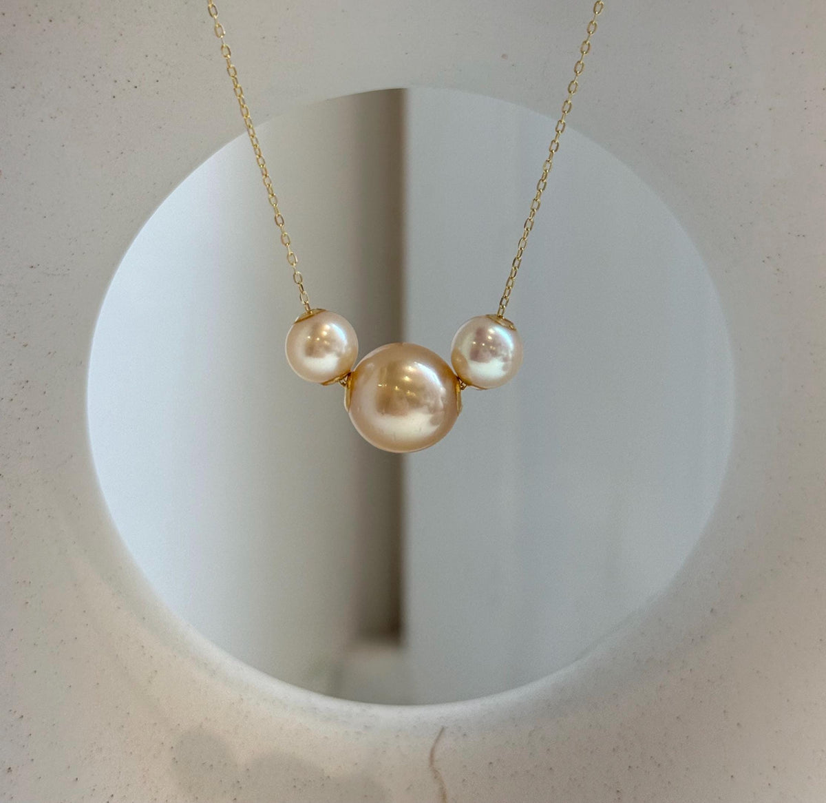 Elly’s Tri Au750 18k Gold South sea golden Akoya ocean Pearls Floating pendants:Extreme luster, 7.7-11.7mm.