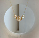 Elly’s Tri Au750 18k Gold South sea golden Akoya ocean Pearls Floating pendants:Extreme luster, 7.7-11.7mm.