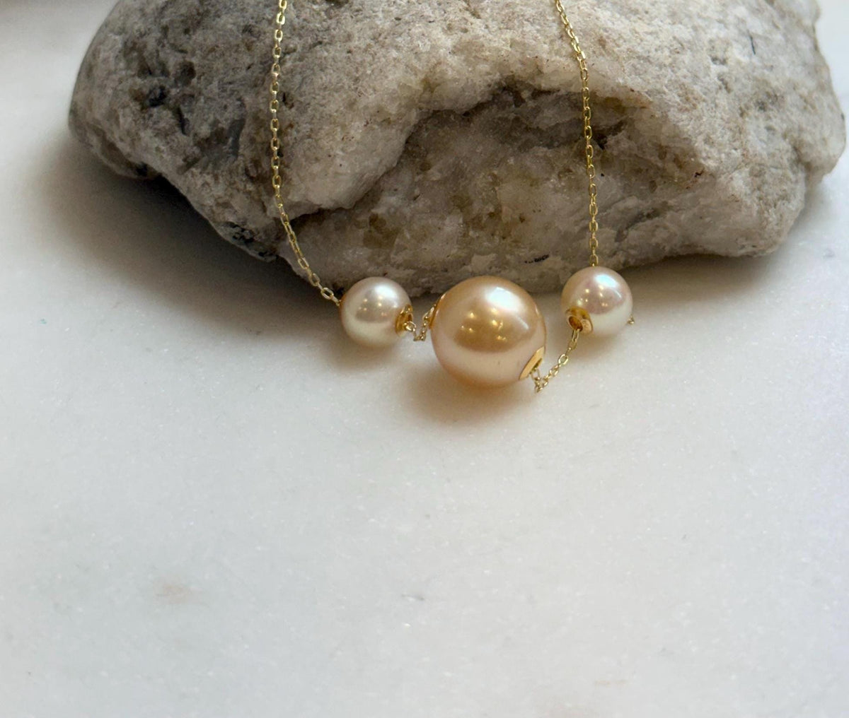 Elly’s Tri Au750 18k Gold South sea golden Akoya ocean Pearls Floating pendants:Extreme luster, 7.7-11.7mm.