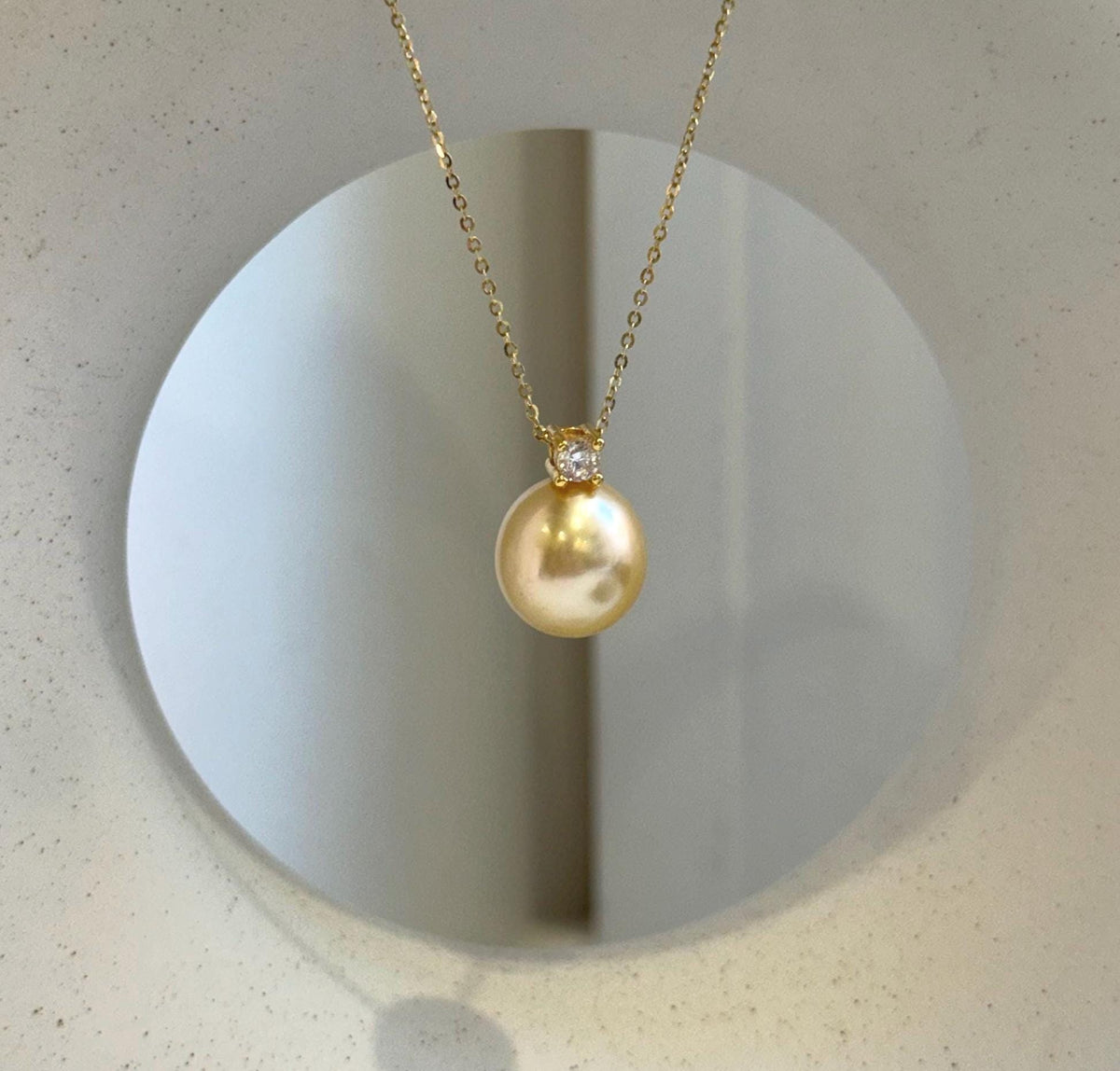 Elly’s 12.6mm Genius South sea champagne gold ocean pearl Pendant: Extreme luster mirrored, 1.8cm high, s925 silver pendant.