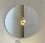 Elly’s 12.6mm Genius South sea champagne gold ocean pearl Pendant: Extreme luster mirrored, 1.8cm high, s925 silver pendant.