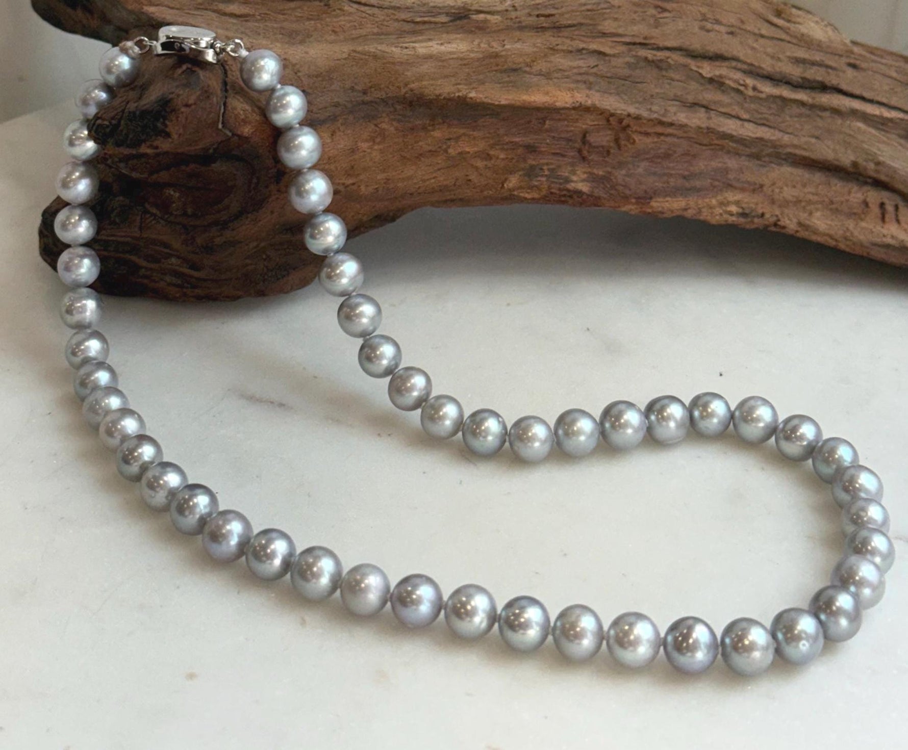 Elly’s 50pcs 7.4-8.4mm Freshwater blue silver round pearls necklace: Extreme luster mirrored, 16.7”, s925 silver necklace strand.