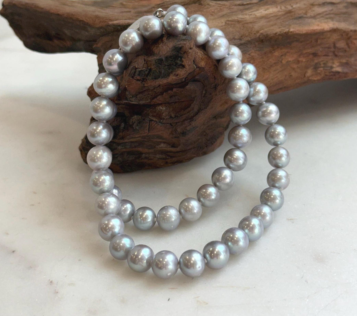 Elly’s 50pcs 7.4-8.4mm Freshwater blue silver round pearls necklace: Extreme luster mirrored, 16.7”, s925 silver necklace strand.