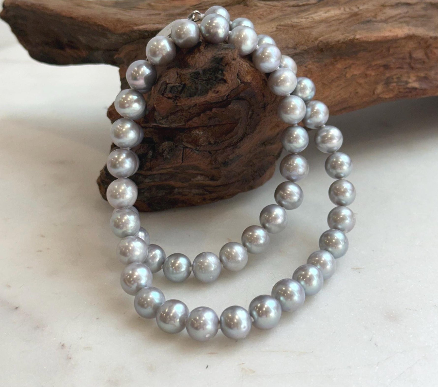 Elly’s 50pcs 7.4-8.4mm Freshwater blue silver round pearls necklace: Extreme luster mirrored, 16.7”, s925 silver necklace strand.