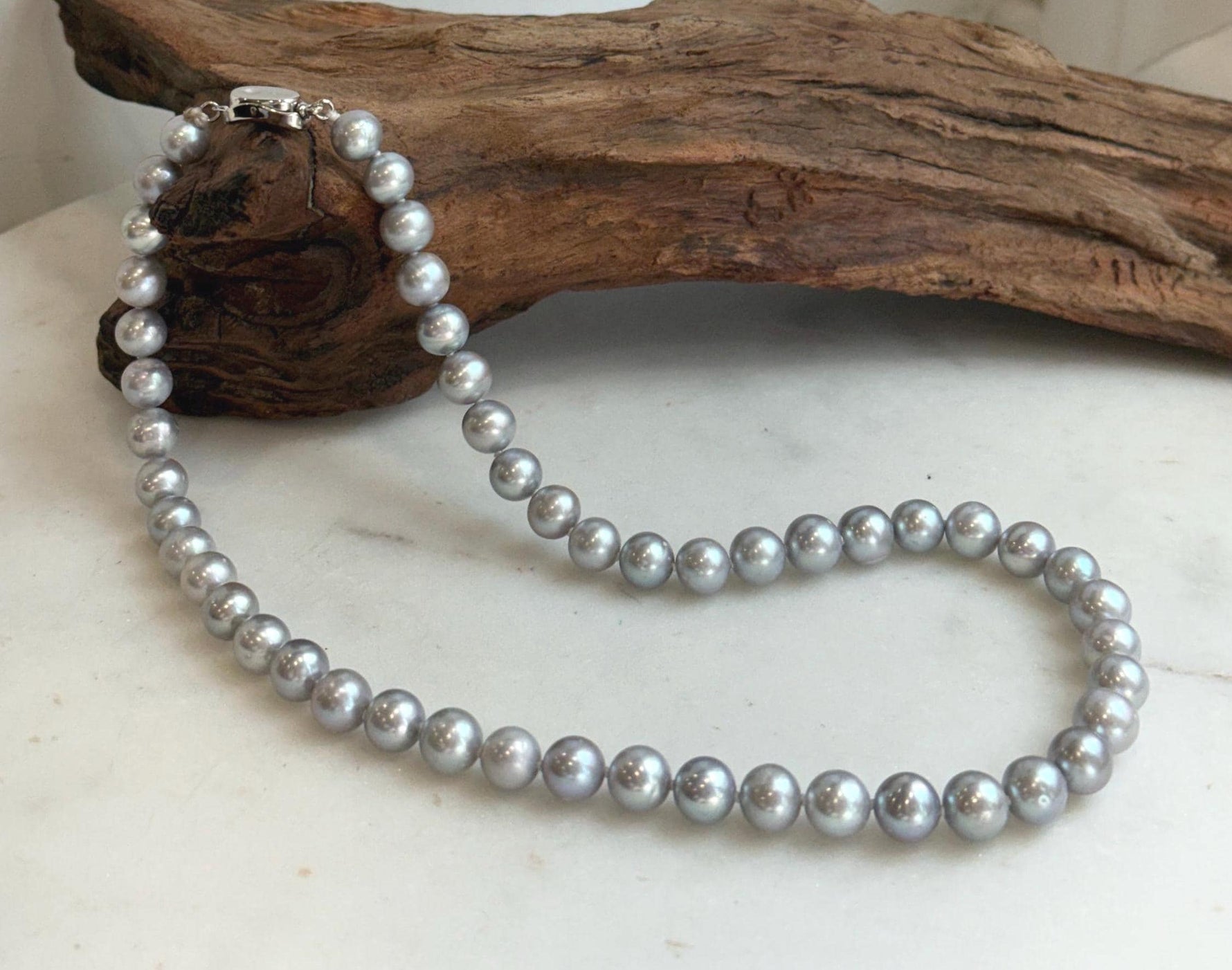 Elly’s 50pcs 7.4-8.4mm Freshwater blue silver round pearls necklace: Extreme luster mirrored, 16.7”, s925 silver necklace strand.