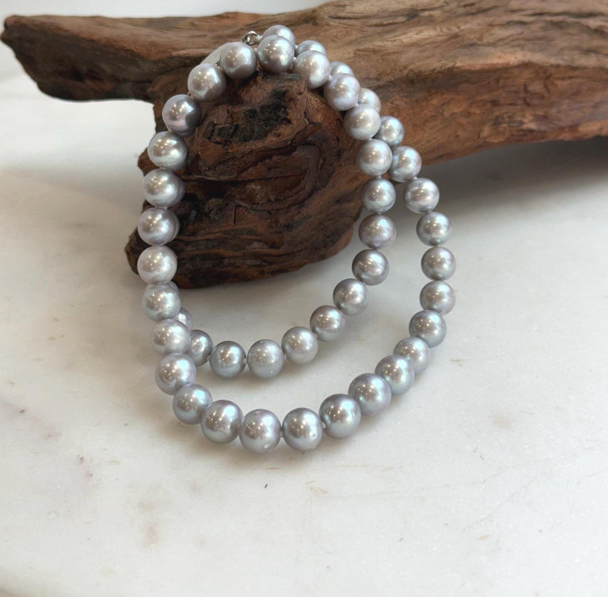 Elly’s 50pcs 7.4-8.4mm Freshwater blue silver round pearls necklace: Extreme luster mirrored, 16.7”, s925 silver necklace strand.