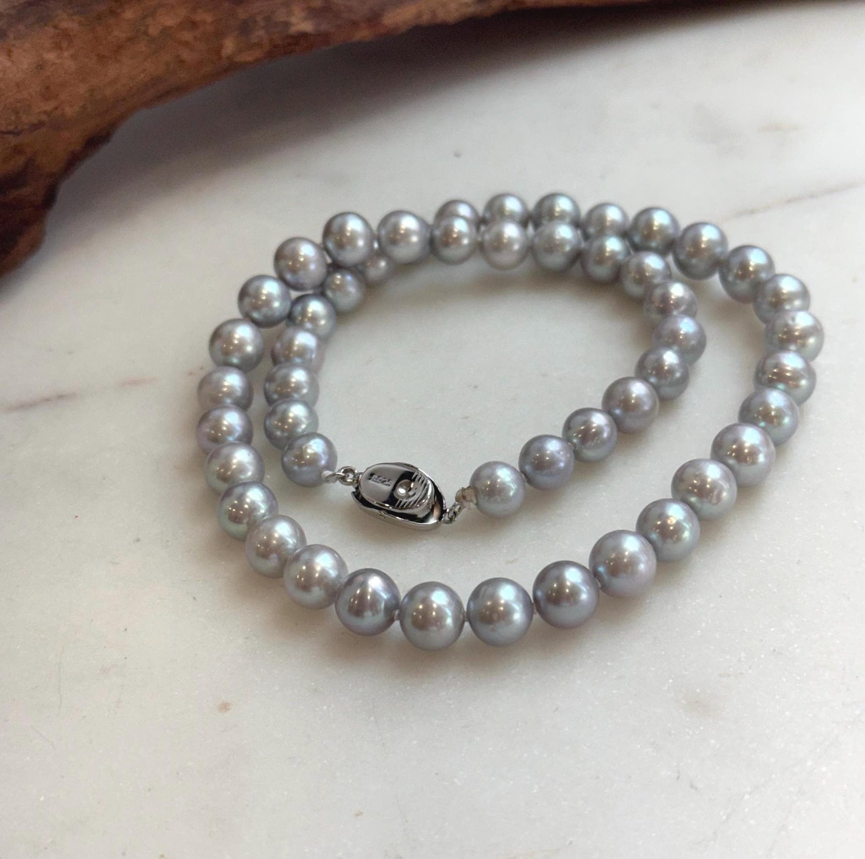 Elly’s 50pcs 7.4-8.4mm Freshwater blue silver round pearls necklace: Extreme luster mirrored, 16.7”, s925 silver necklace strand.