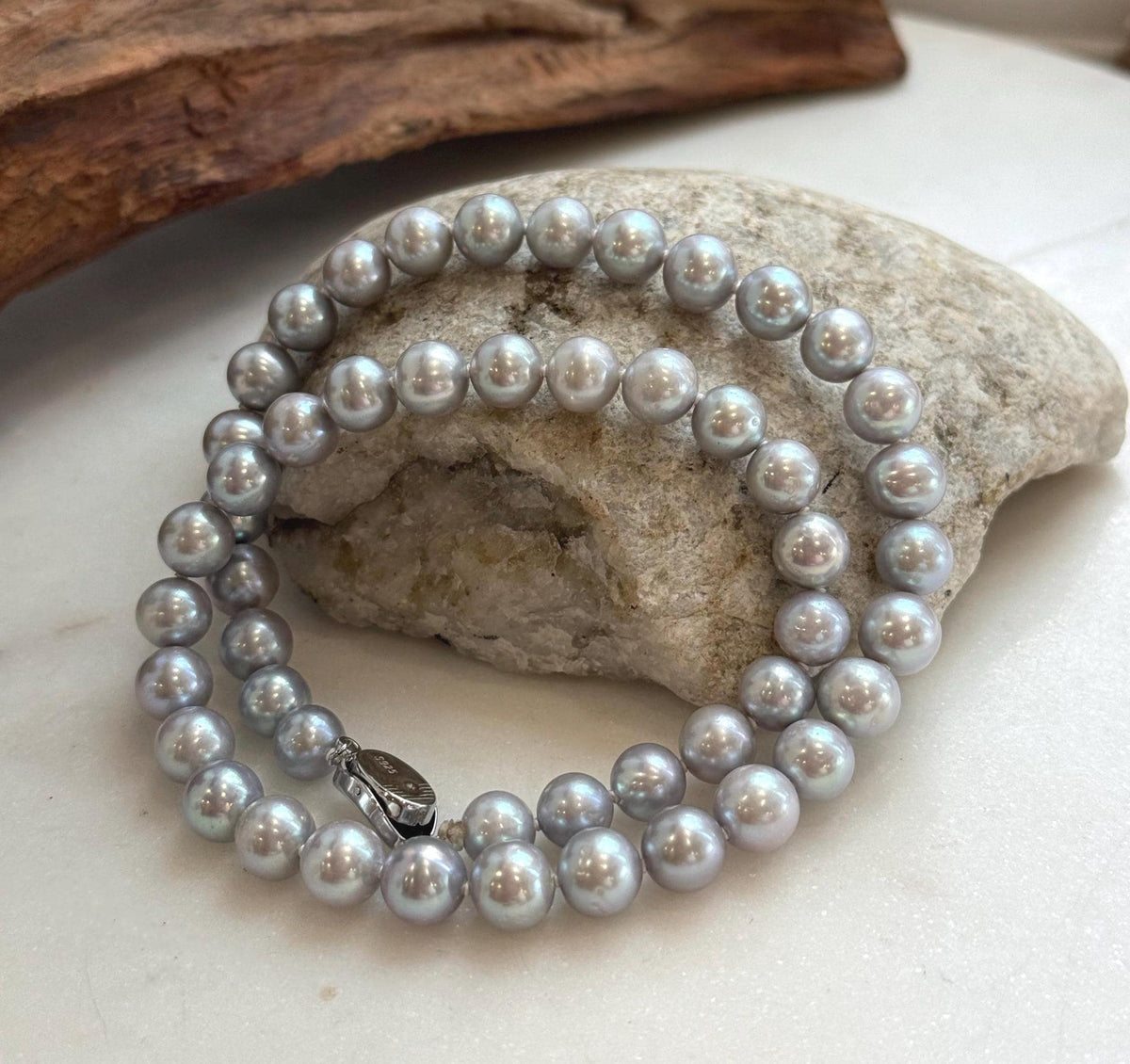 Elly’s 50pcs 7.4-8.4mm Freshwater blue silver round pearls necklace: Extreme luster mirrored, 16.7”, s925 silver necklace strand.