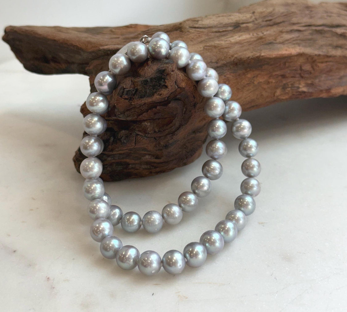 Elly’s 50pcs 7.4-8.4mm Freshwater blue silver round pearls necklace: Extreme luster mirrored, 16.7”, s925 silver necklace strand.