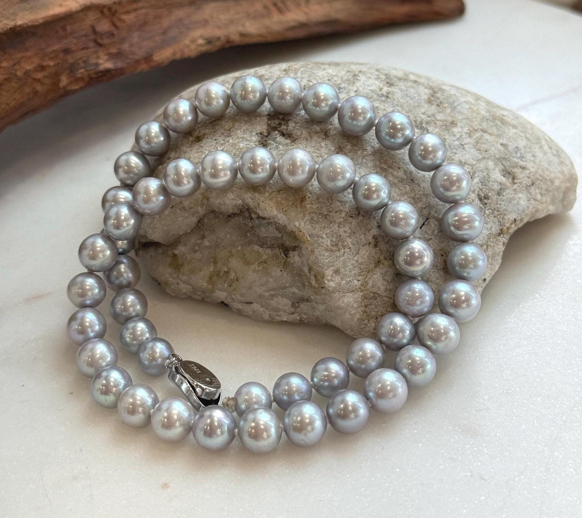 Elly’s 50pcs 7.4-8.4mm Freshwater blue silver round pearls necklace: Extreme luster mirrored, 16.7”, s925 silver necklace strand.