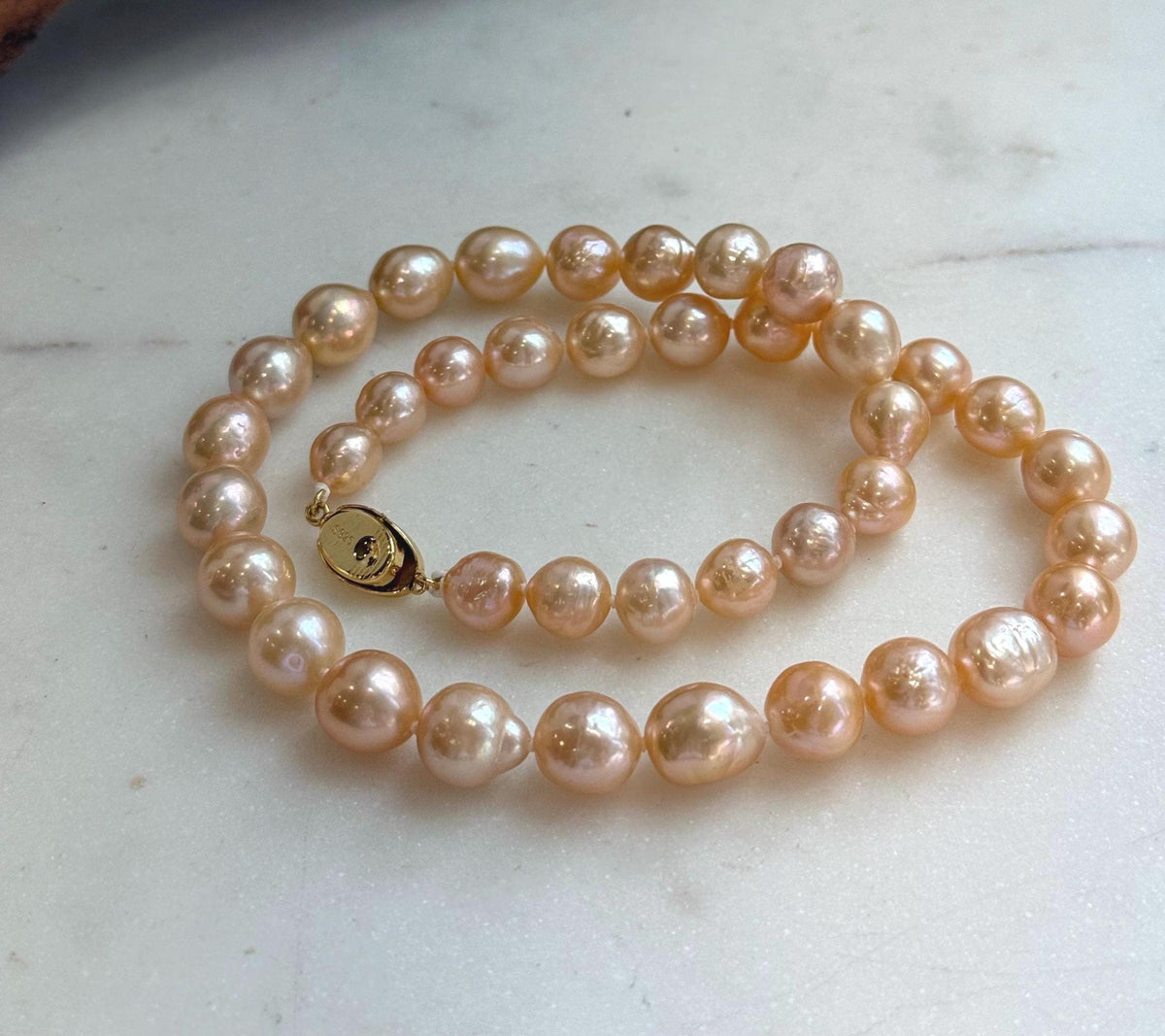 Elly’s 40pcs 8-10mm Freshwater peach gold pearls necklace: Extreme luster mirrored, 17.1”, s925 silver necklace strand.