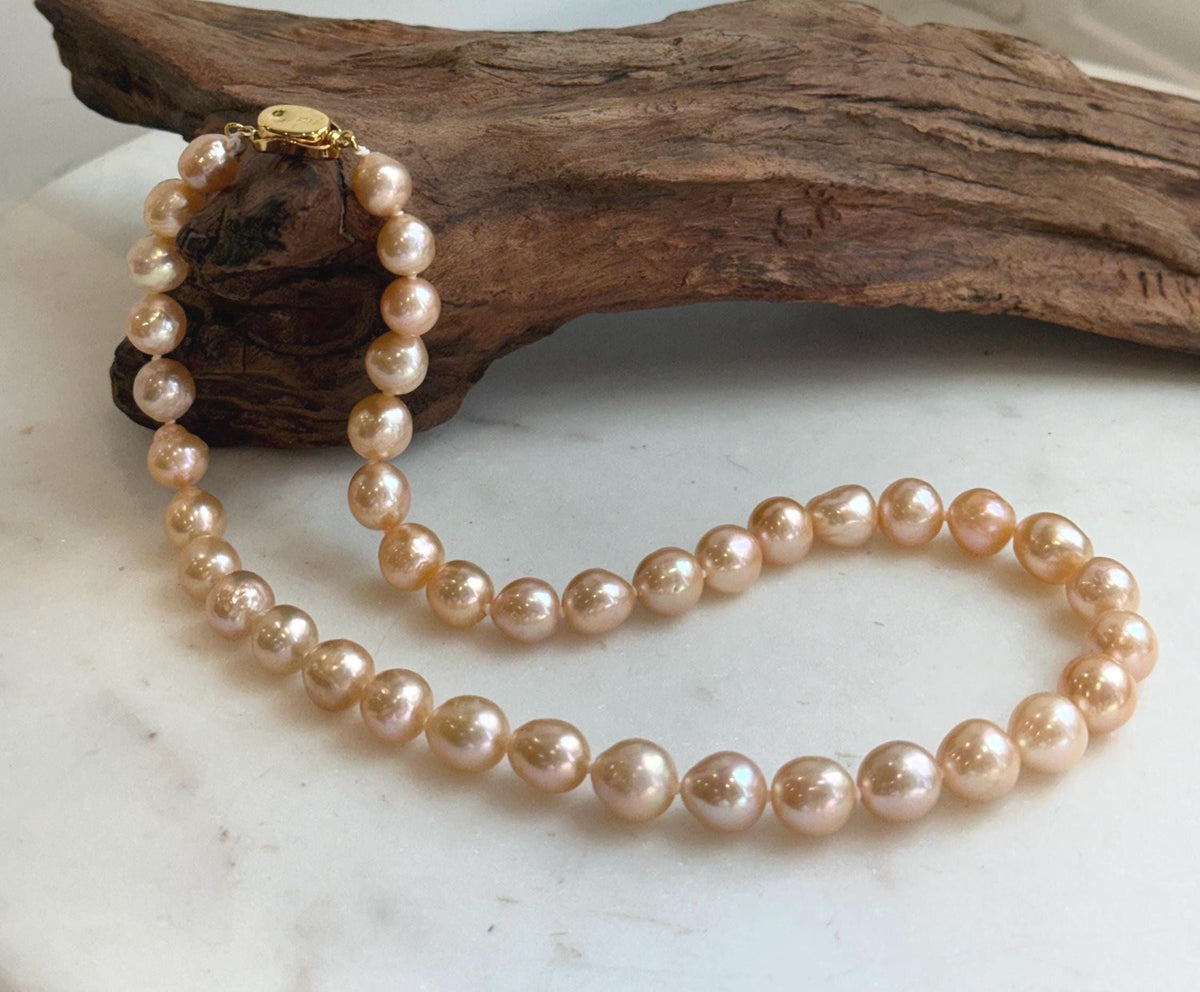 Elly’s 40pcs 8-10mm Freshwater peach gold pearls necklace: Extreme luster mirrored, 17.1”, s925 silver necklace strand.