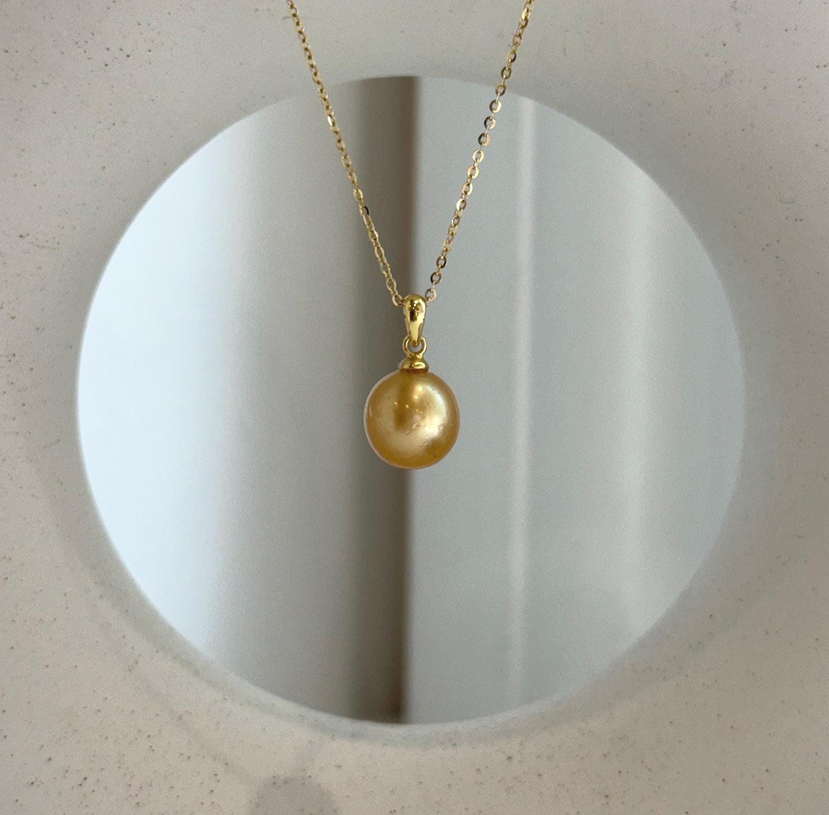 Elly’s 10.1mm South Sea deep Gold ocean Pearl pendant: Extreme luster mirrored, 1.7cm high, S925 silver pendant.
