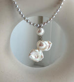 Elly’s Freshwater Large Petal baroque white pearl necklace:Extreme luster mirrored, 19.3x31mm, to 17.9”, S925 silver necklace strand.