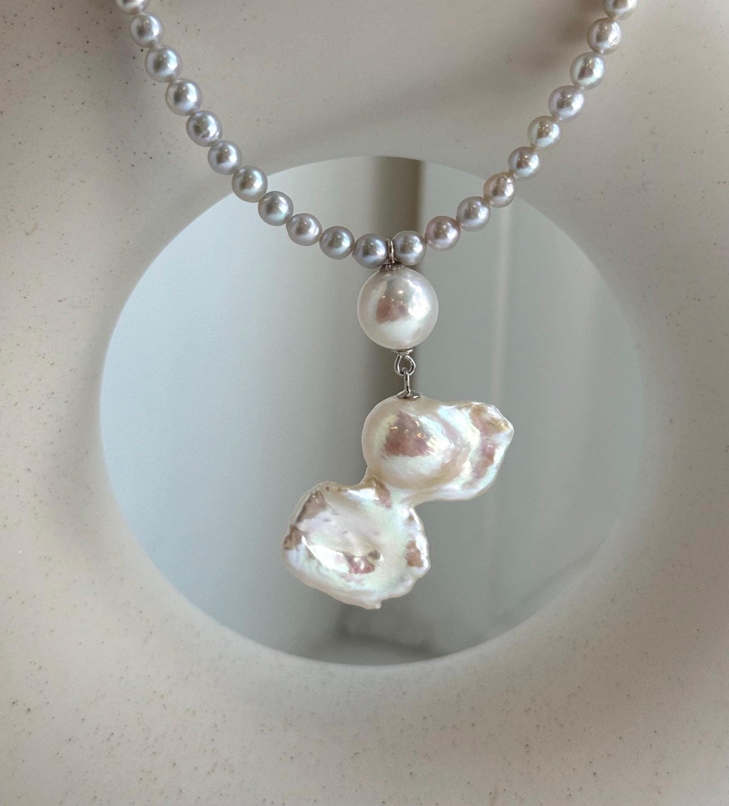 Elly’s Freshwater Large Petal baroque white pearl necklace:Extreme luster mirrored, 19.3x31mm, to 17.9”, S925 silver necklace strand.
